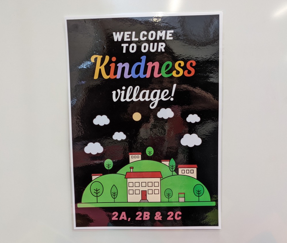 SCTE kindness village sign